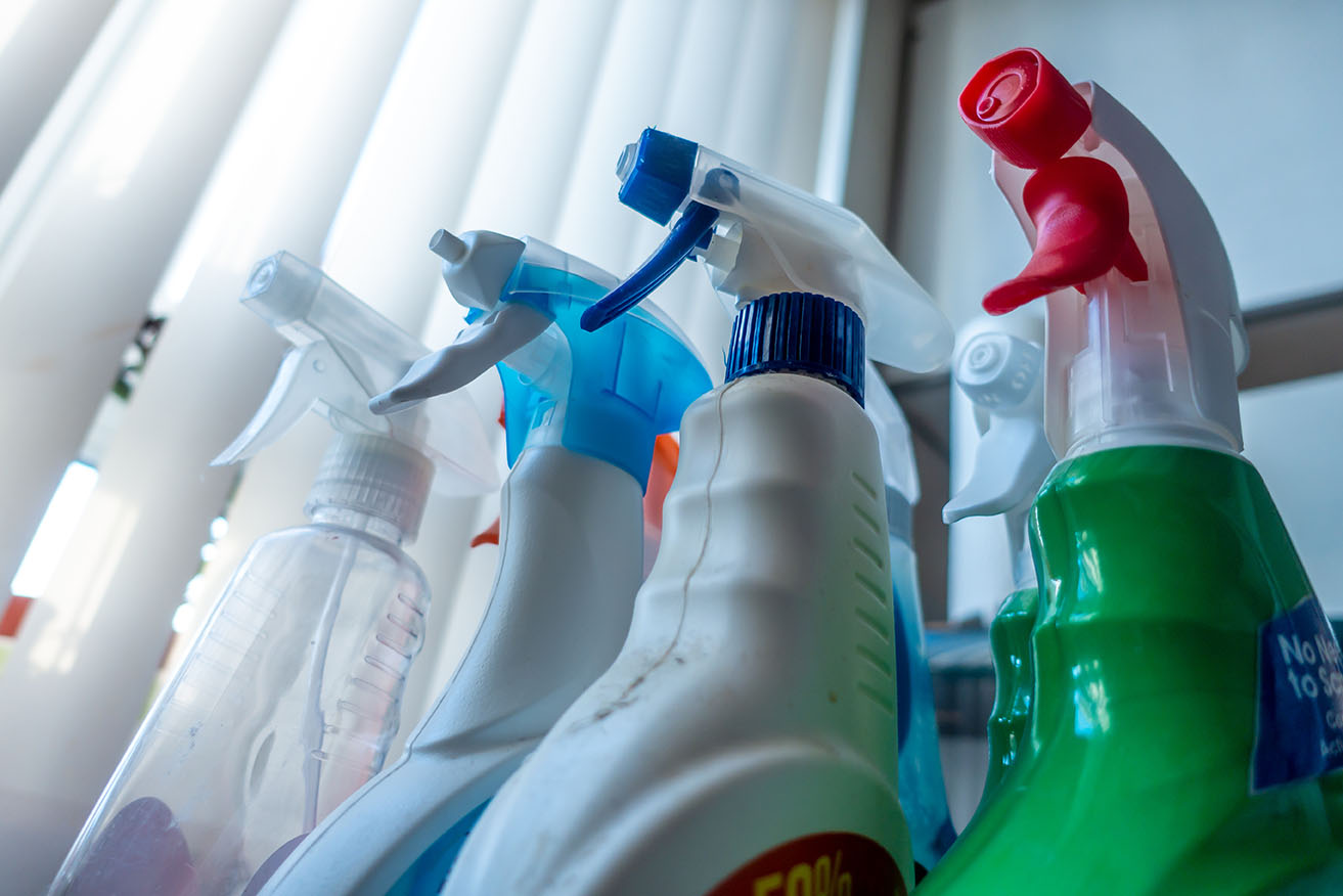 Spray bottles of cleaning products for disinfecting and making c Spray bottles of cleaning products for disinfecting and making c